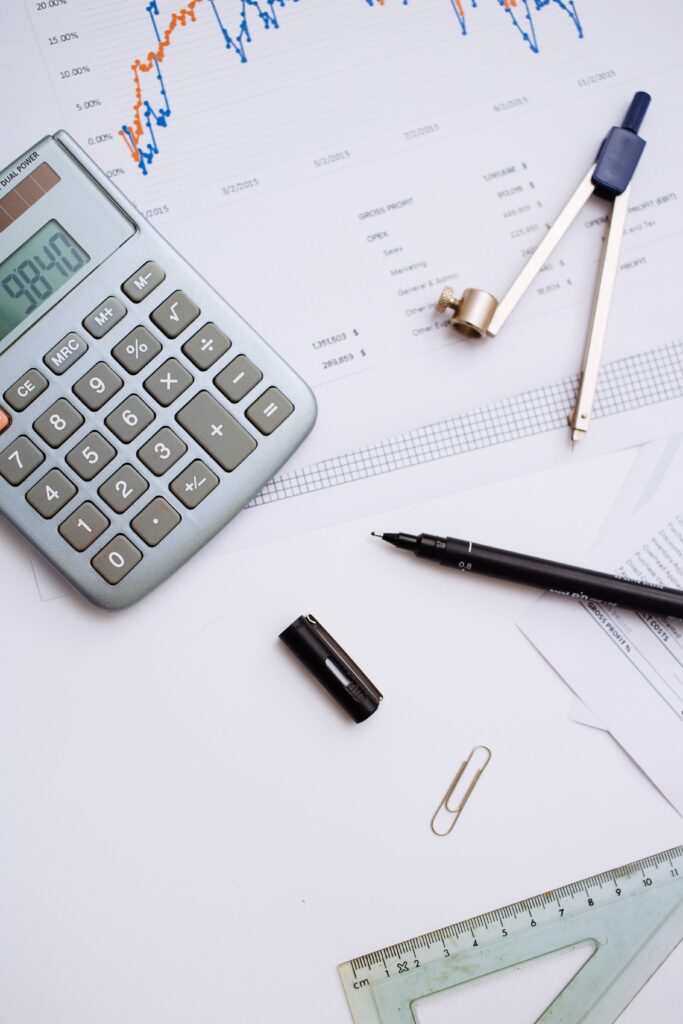 Close up shot business study essentials on a white desk - work and study aesthetics
